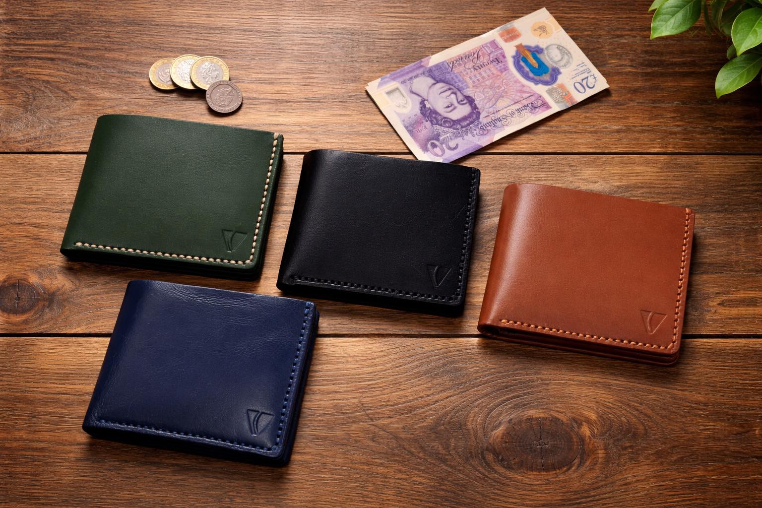 Handmade leather wallets on a wooden table